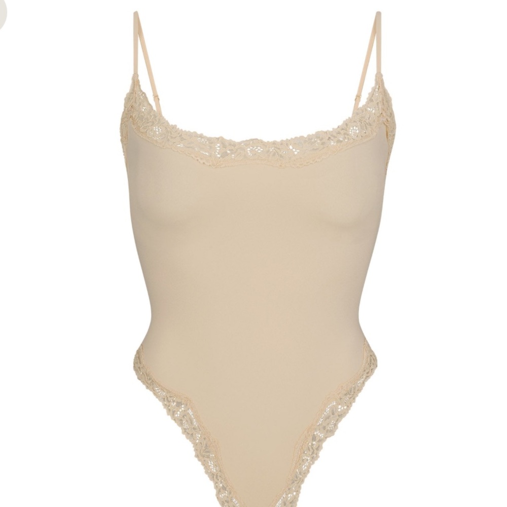 Skims lace trim body suit
